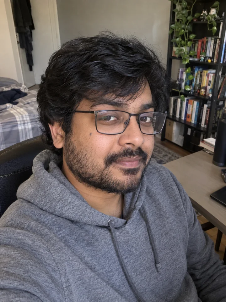 Man with black hair and a beard, casual appearance. AI-generated illustration.